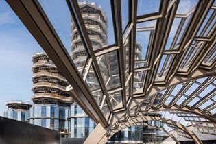 Heatherwick Studio Unveils Olympias Glass Canopy Echoing the Continuous Arched Shape of the Grand Hall